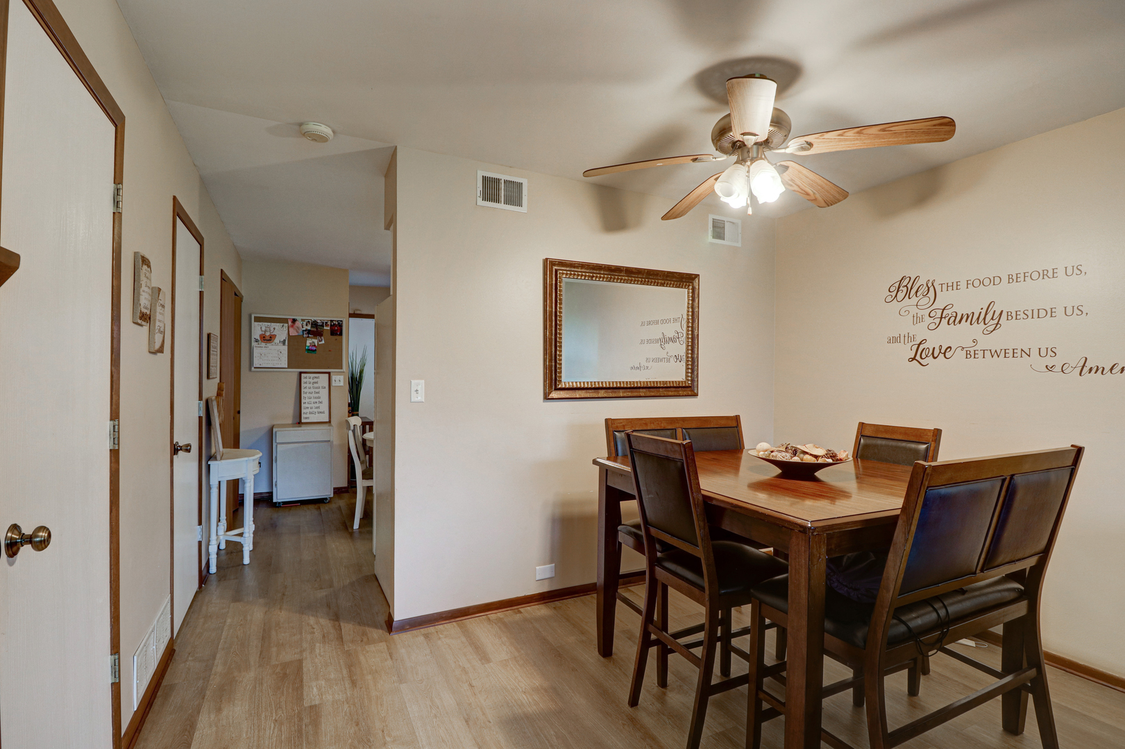 17482 Chestnut Lane Gurnee, IL 60031 - Photo 12 of 23 a dining room with furniture and wooden floor