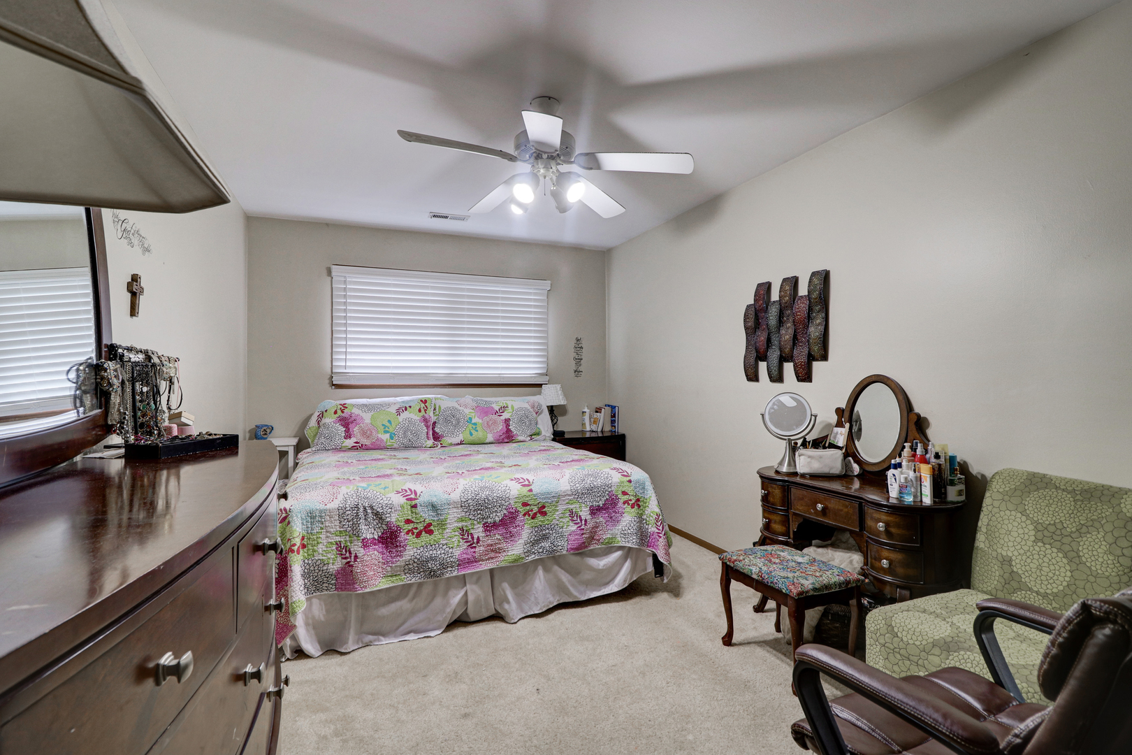 17482 Chestnut Lane Gurnee, IL 60031 - Photo 19 of 23 a bedroom that has a bed and a chair in it