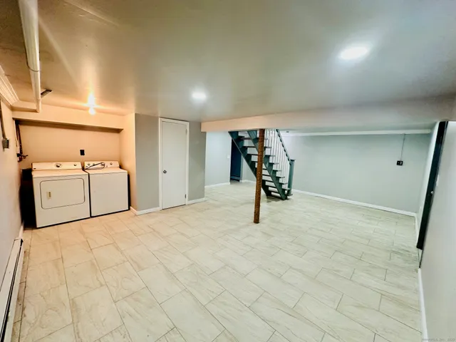 a bathroom with a toilet and a sink