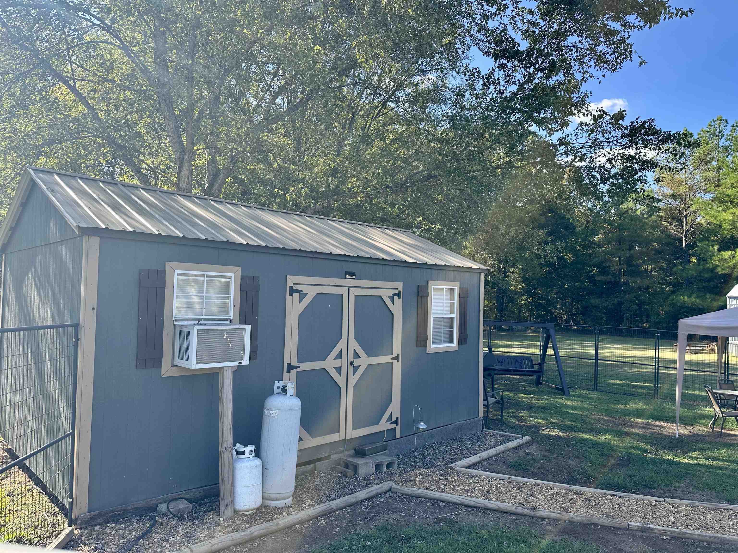 4769 Pleasant Site Road Selmer, TN 38375 - Photo 23 of 28 a view of a house with a yard
