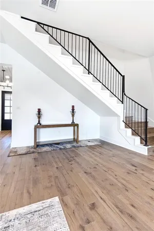 a kitchen with a table and chairs in it