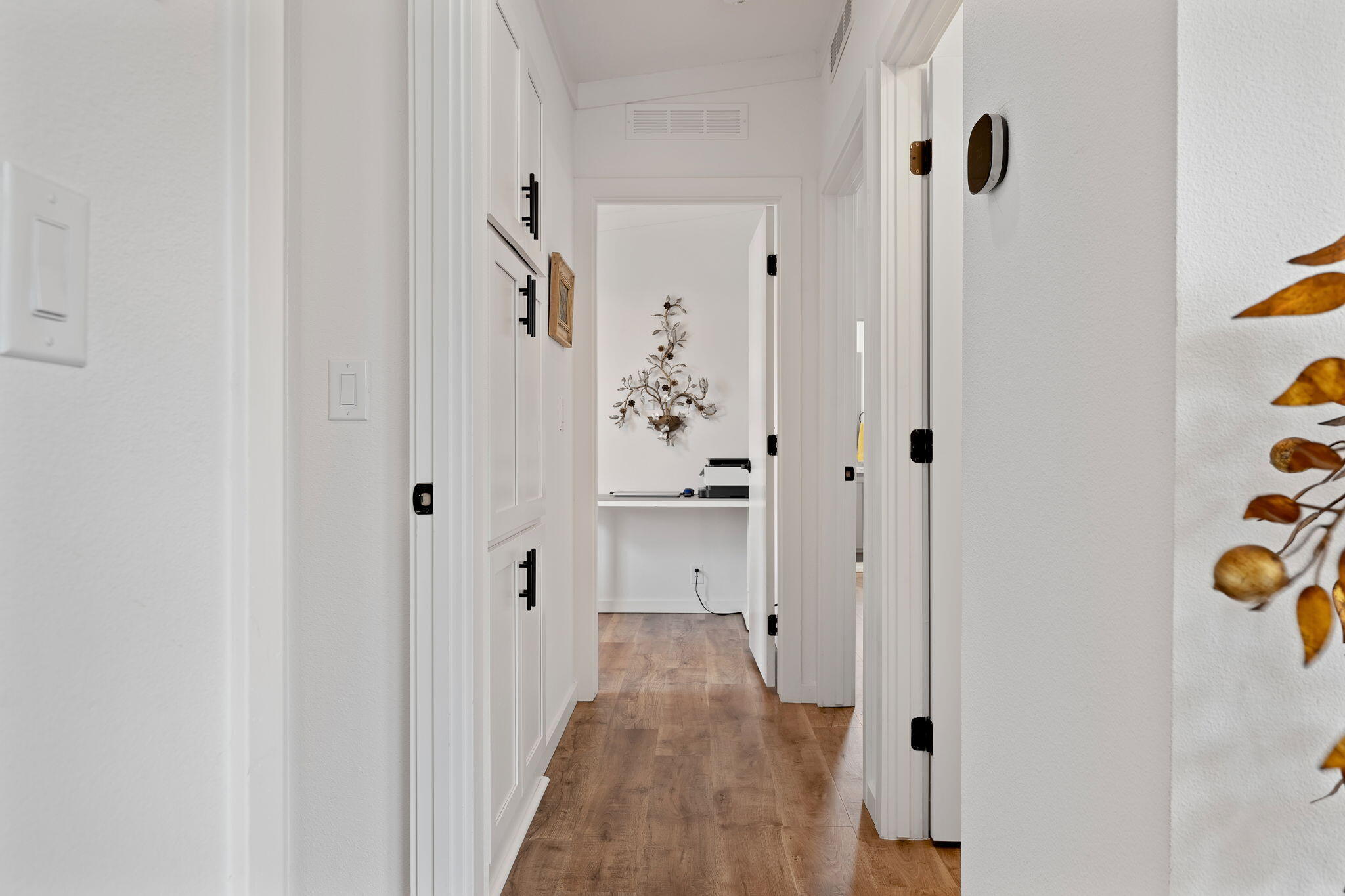 333 Old Mill Road, Unit SPC 79 Santa Barbara, CA 93110 - Photo 12 of 30 a view of a hallway with wooden floor and closet