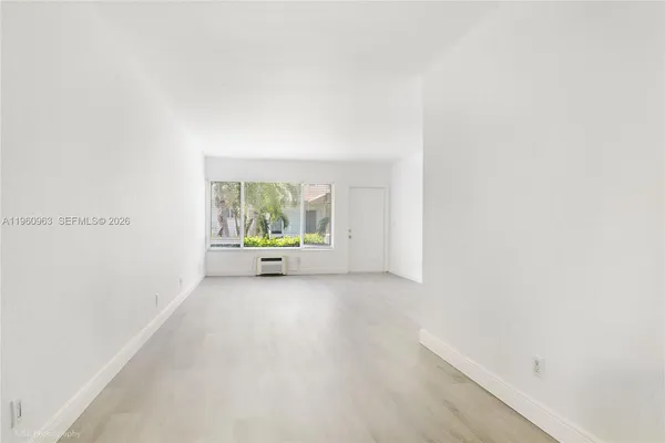a view of a room with a window