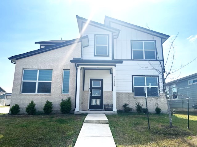 3729 Beechmont Dr. Pflugerville, TX 78660 - Photo 1 of 1 a front view of a house with garden