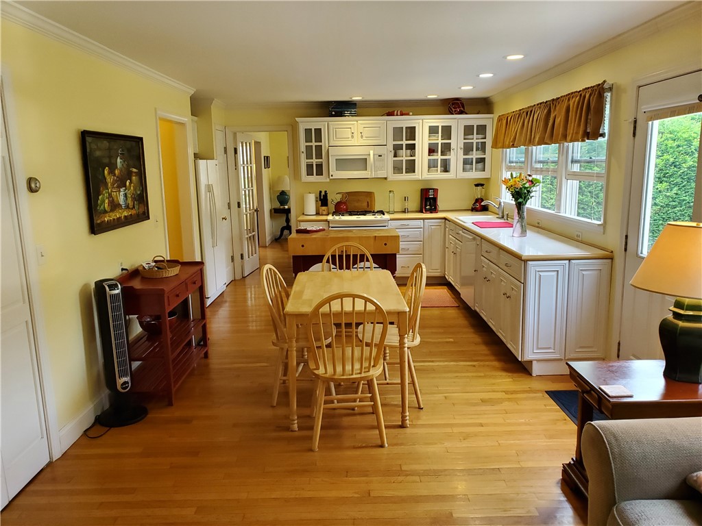 4 Key Court Newport, RI 02840 - Photo 20 of 49 Entry View from family Room to Kitchen, dining room and side door to deck and back yard