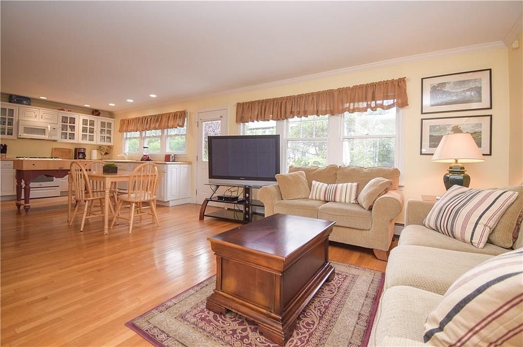 4 Key Court Newport, RI 02840 - Photo 22 of 49 Entry view from Breezeway door off driveway to Eat in Kitchen family room & Door to deck area