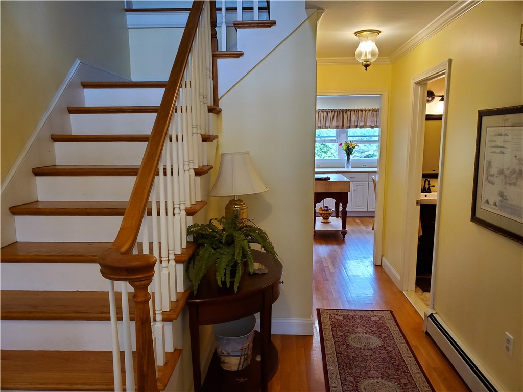 4 Key Court Newport, RI 02840 - Photo 28 of 49 Stairway to 2nd floor & view to 1st floor bath and kitchen