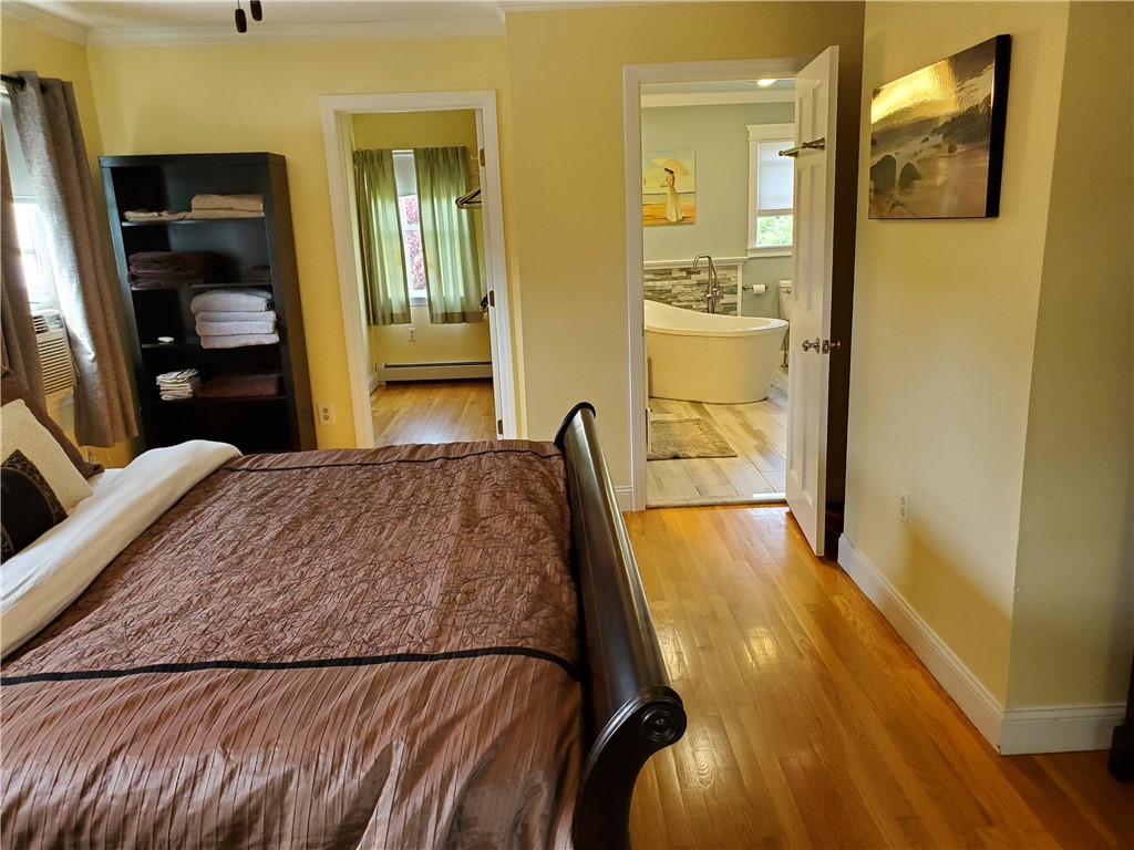 4 Key Court Newport, RI 02840 - Photo 31 of 49 Primary Bedroom view to walk in closet & Spa Bathroom