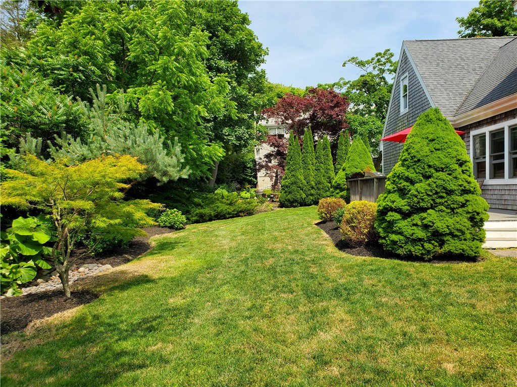 4 Key Court Newport, RI 02840 - Photo 47 of 49 Rear yard & gardens East view to back yard and steps to deck