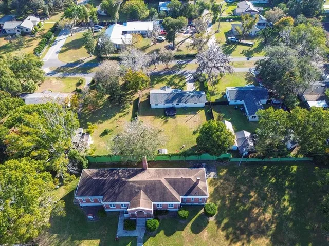 a view of house with swimming pool and outdoor space