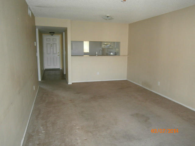 6701 Mallards Cove Road, Unit 14F Jupiter, FL 33458 - Photo 7 of 8 living room (3)
