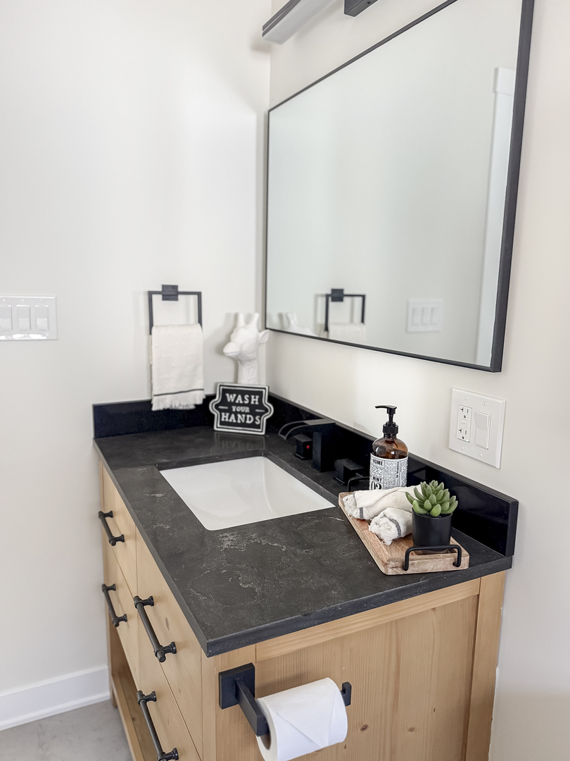 3128 Arthur Avenue Brookfield, IL 60513 - Photo 13 of 35 a bathroom with a granite countertop sink and a mirror