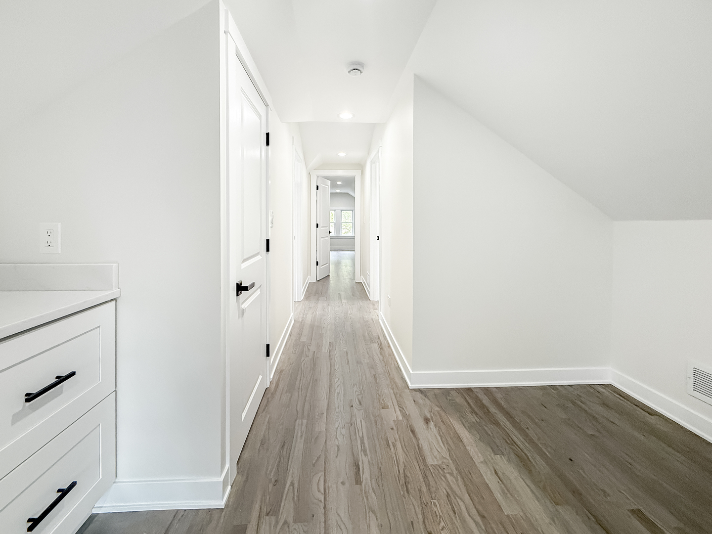 3128 Arthur Avenue Brookfield, IL 60513 - Photo 19 of 35 a view of a hallway with wooden floor