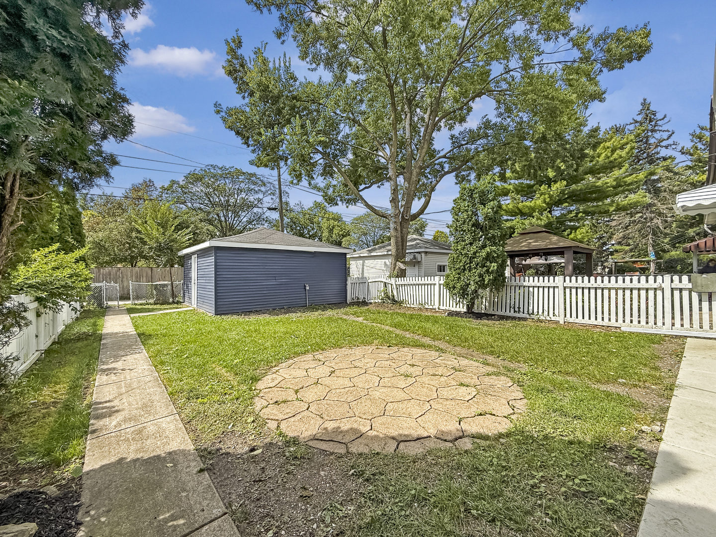 3128 Arthur Avenue Brookfield, IL 60513 - Photo 34 of 35 a view of a backyard with large trees