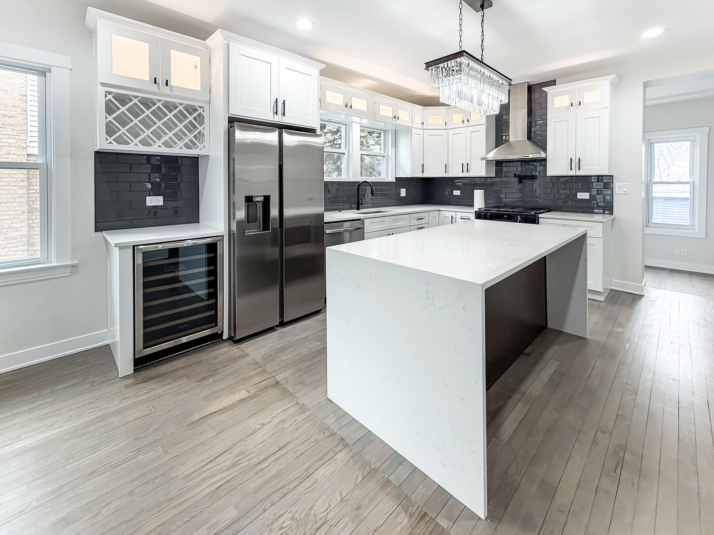 3128 Arthur Avenue Brookfield, IL 60513 - Photo 7 of 35 a kitchen with kitchen island a counter top space a sink appliances and cabinets