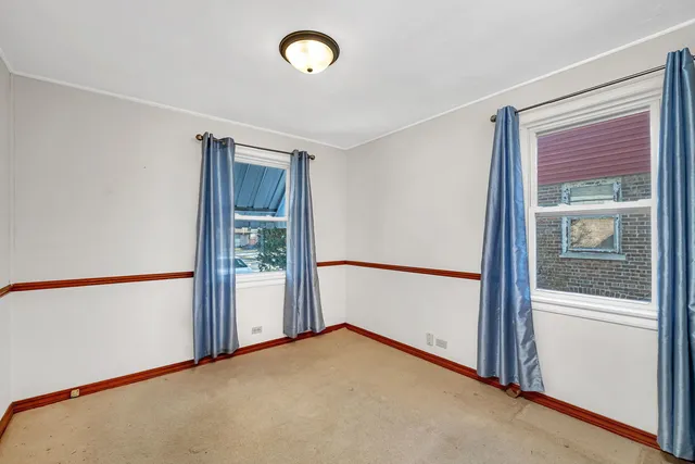 a view of an empty room with window