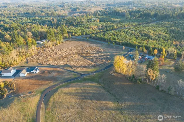 a view of a swimming pool with an outdoor seating