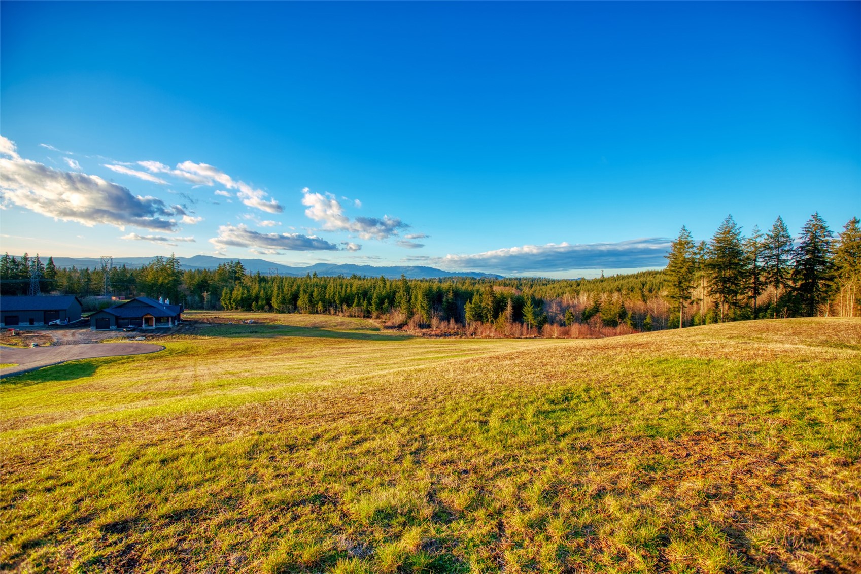 14010 Quiet Waters Lane Southwest Rochester, WA 98579 - Photo 9 of 17 a view of an ocean house and outdoor space