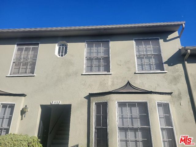 a bathroom with a sink and toilet