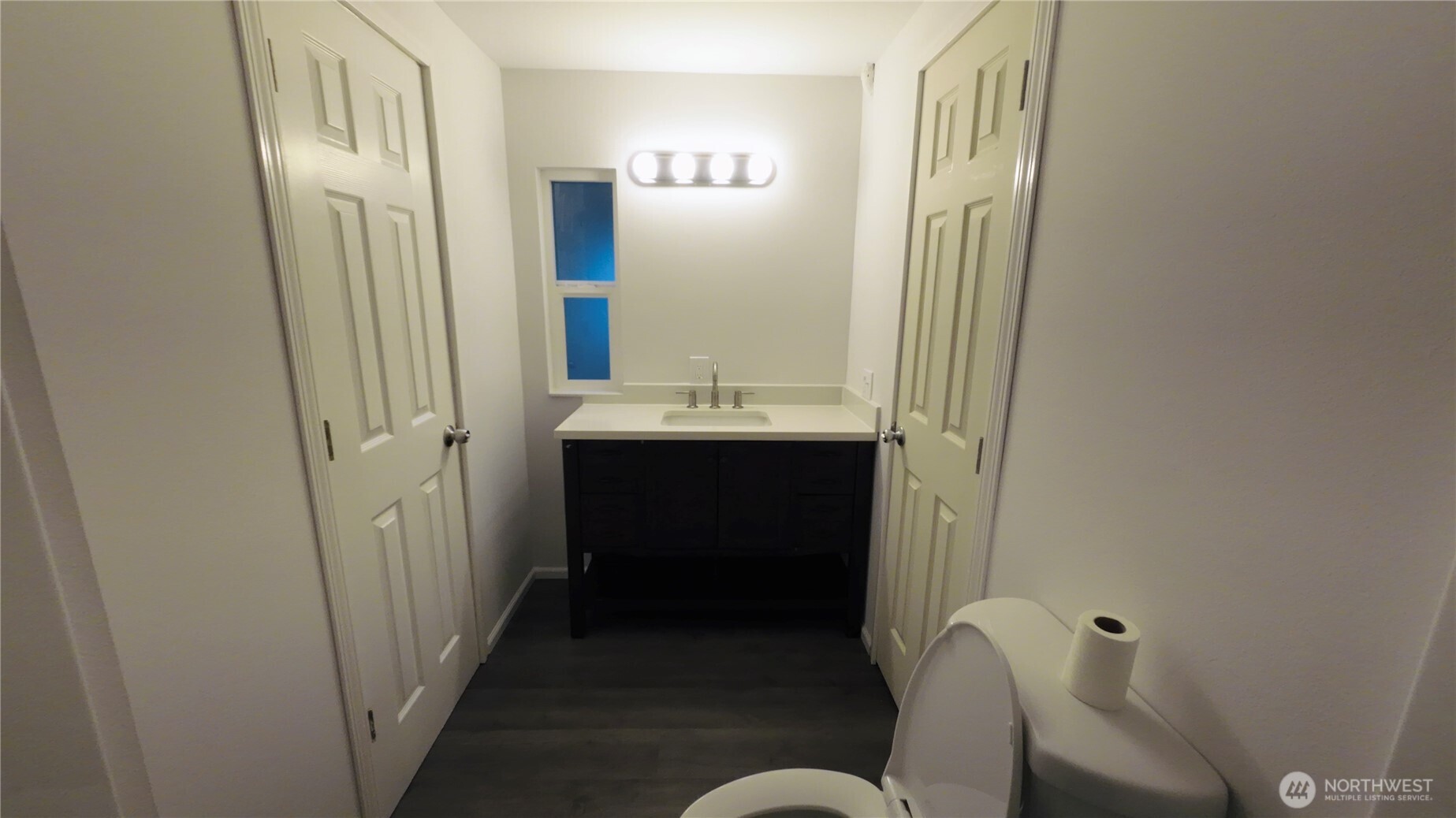 6800 Enterprise, Unit 9 Ferndale, WA 98248 - Photo 12 of 22 a bathroom with a sink and a mirror