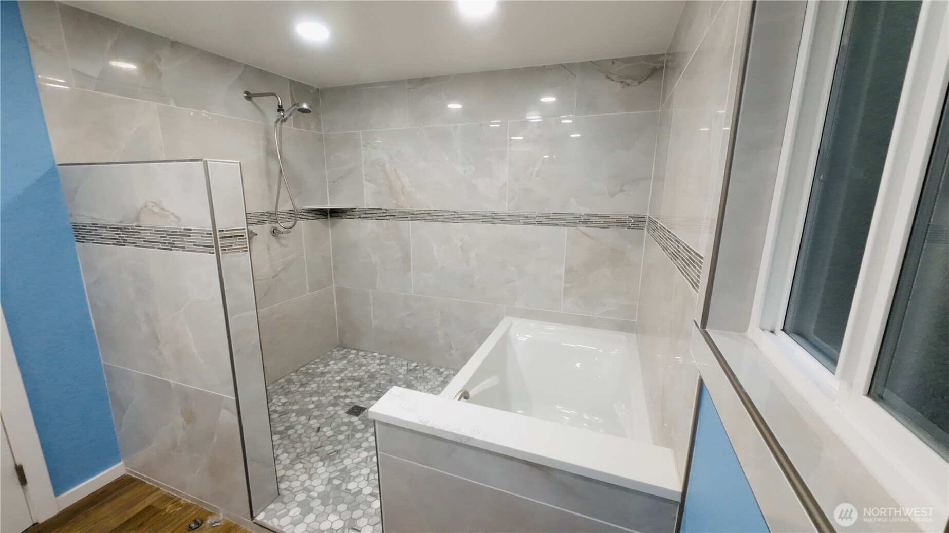 6800 Enterprise, Unit 9 Ferndale, WA 98248 - Photo 15 of 22 a bathroom with a sink a glass door shower and vanity