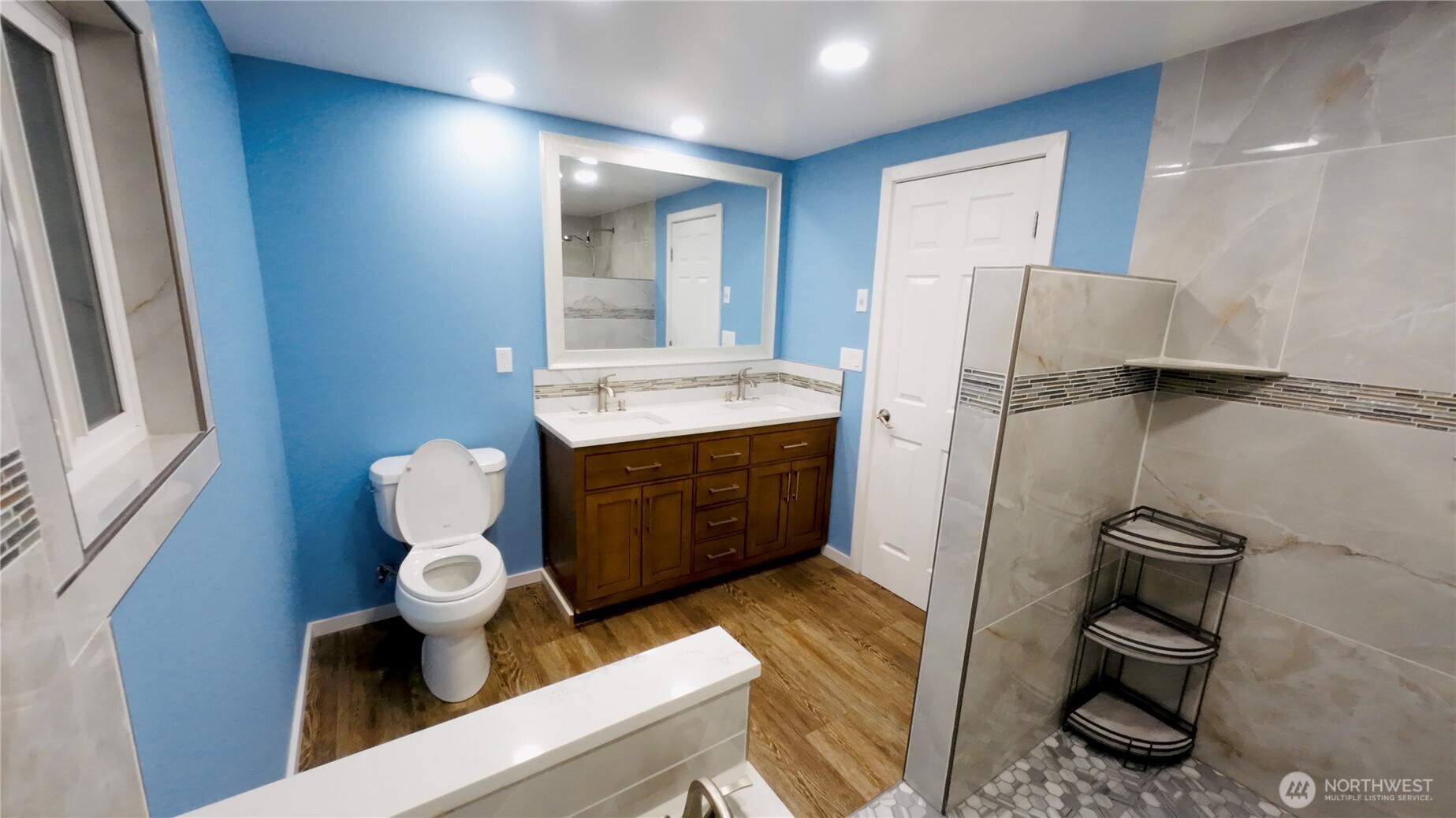 6800 Enterprise, Unit 9 Ferndale, WA 98248 - Photo 16 of 22 a bathroom with a toilet sink and a mirror