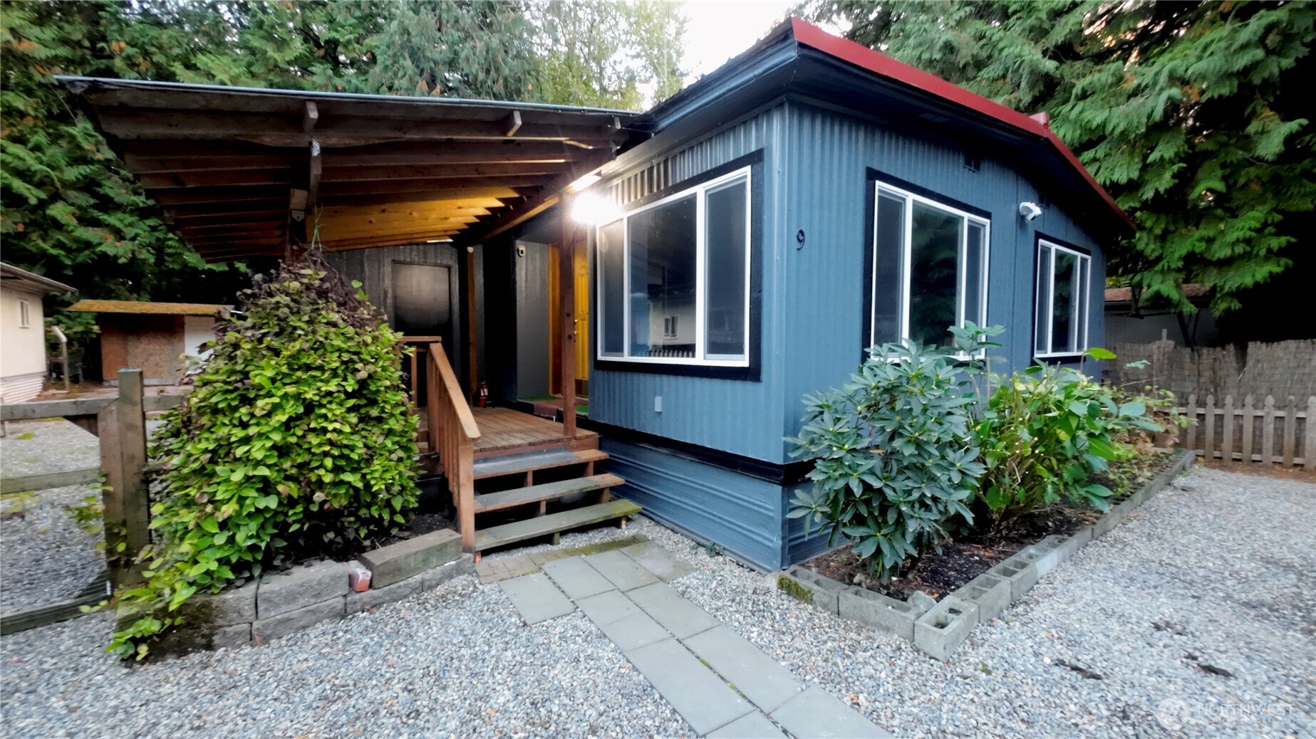 6800 Enterprise, Unit 9 Ferndale, WA 98248 - Photo 3 of 22 a front view of a house with garden