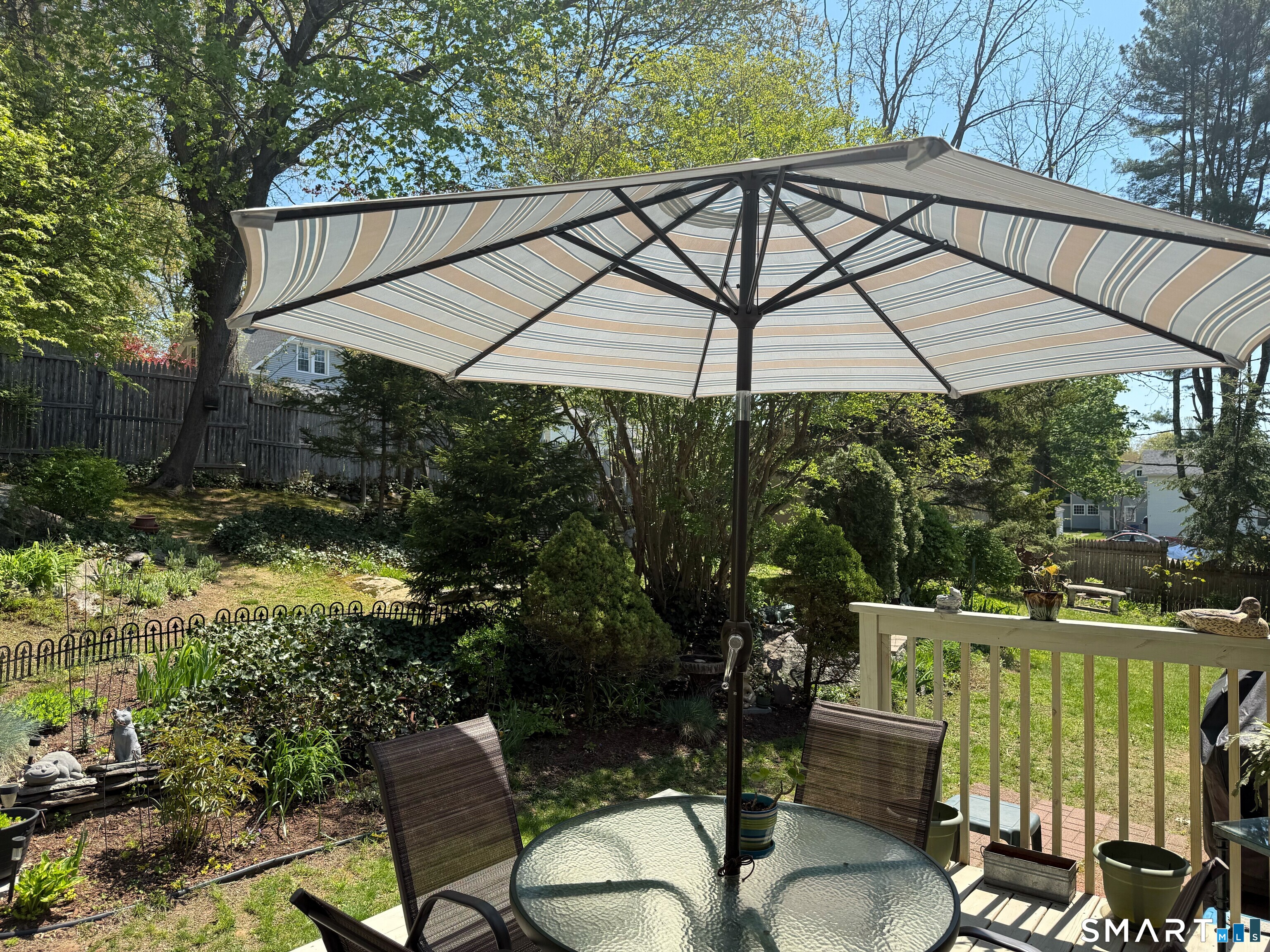 15 Grove Street Deep River, CT 06417 - Photo 2 of 25 a view of an chair and table in the patio