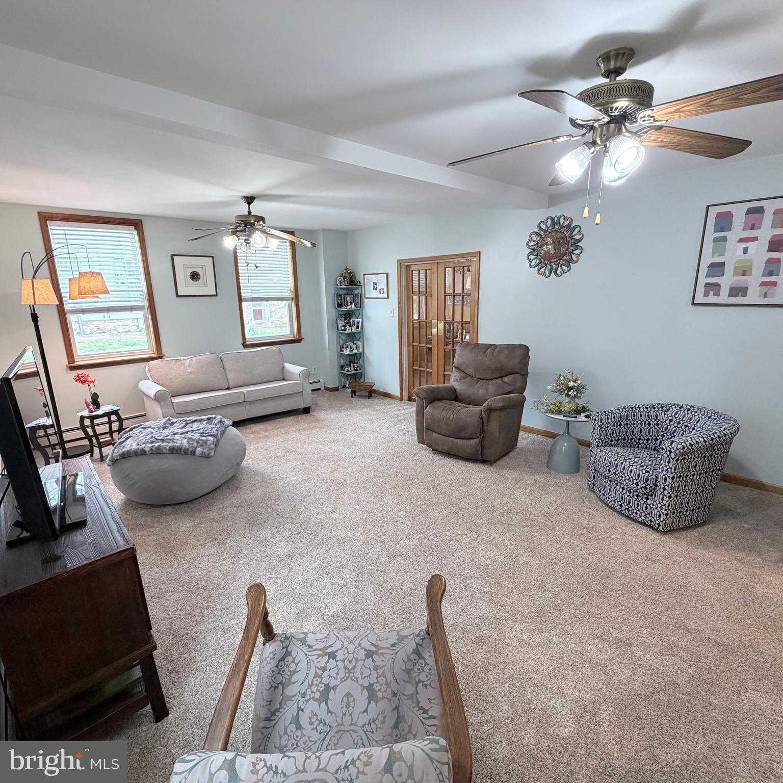 12997 Main Street Fort Loudon, PA 17224 - Photo 10 of 48 a living room with furniture and a flat screen tv