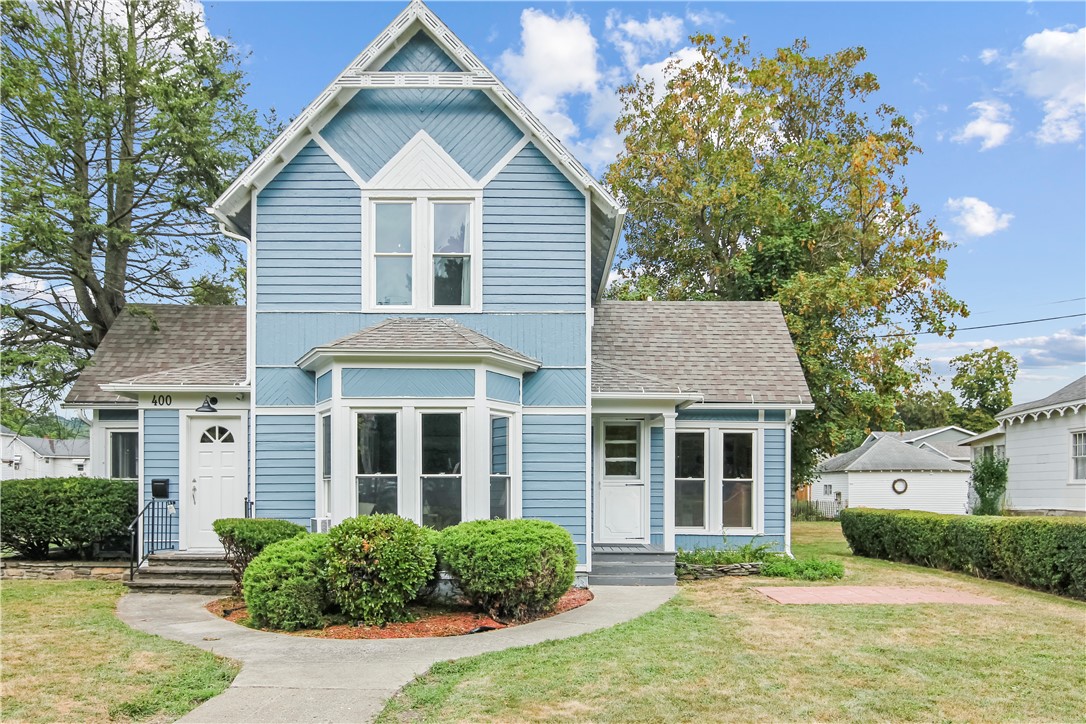400 North Porter Street Dix, NY 14891 - Photo 1 of 35 Charming Blue Victorian-Style Home with Bay Window