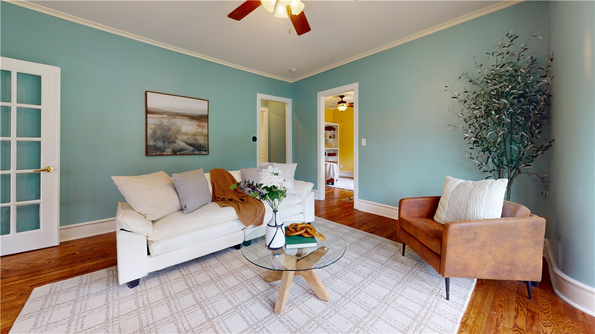 400 North Porter Street Dix, NY 14891 - Photo 11 of 35 Welcoming living room with gleaming hardwood floor