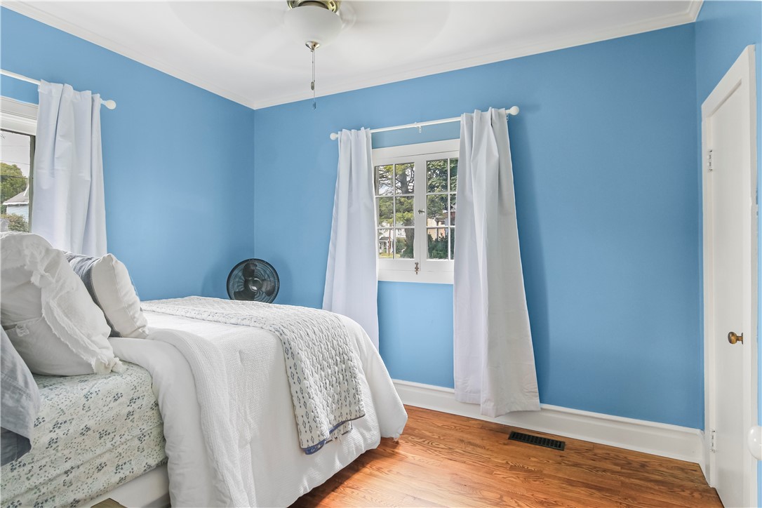 400 North Porter Street Dix, NY 14891 - Photo 17 of 35 First-Floor Bedroom Featuring Hardwood Floors, Fr