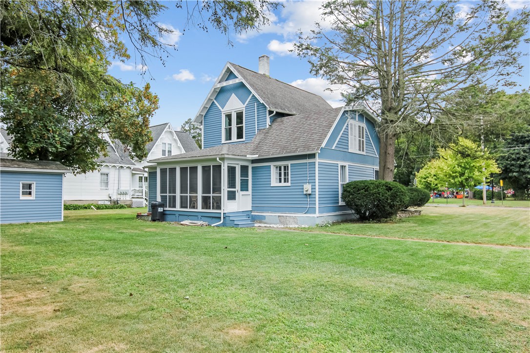 400 North Porter Street Dix, NY 14891 - Photo 3 of 35 Rear and Side View Showcasing the Spacious Yard, S