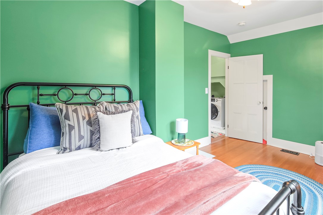 400 North Porter Street Dix, NY 14891 - Photo 31 of 35 Bright Second-Floor Bedroom with Hardwood Floors a