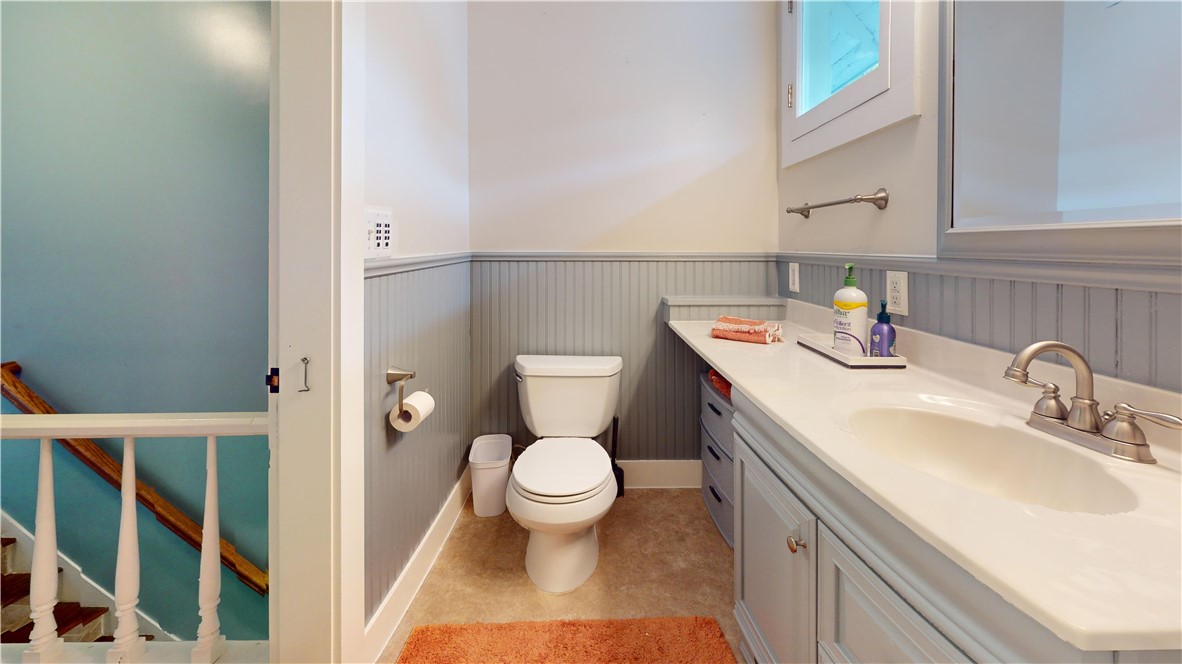 400 North Porter Street Dix, NY 14891 - Photo 35 of 35 Freshly updated half bath featuring beadboard wain