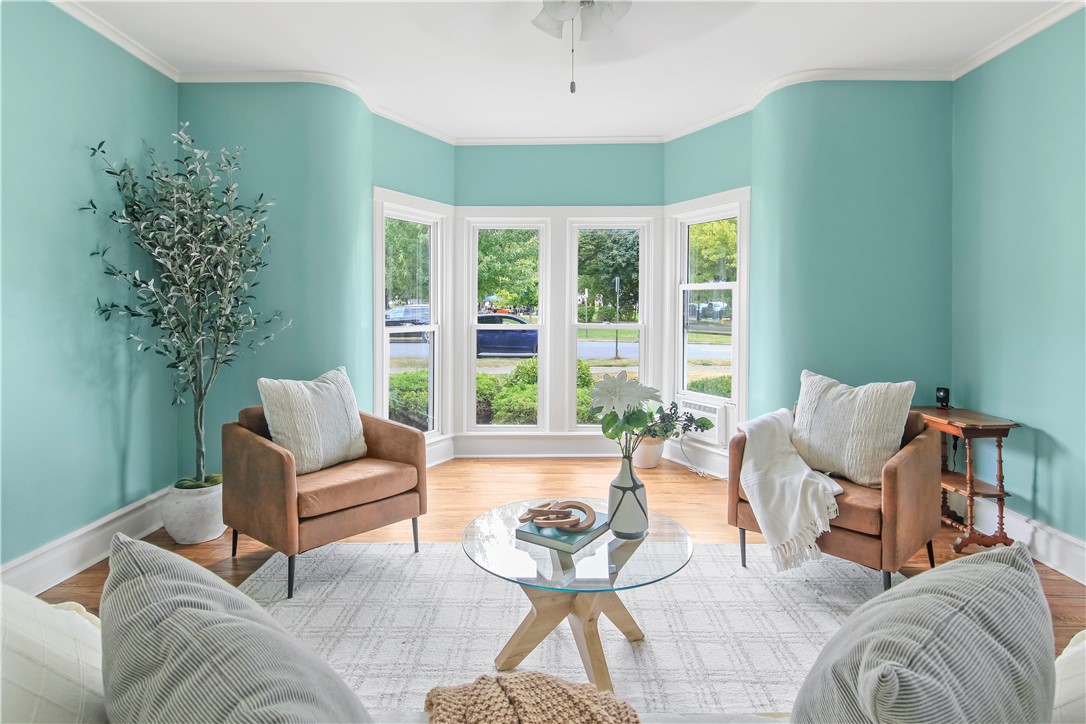 400 North Porter Street Dix, NY 14891 - Photo 7 of 35 Sun-Filled Living Room with Bay Windows Overlookin