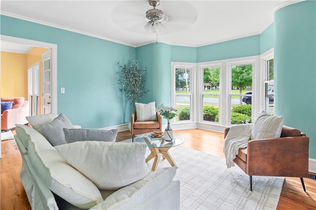 400 North Porter Street Dix, NY 14891 - Photo 8 of 35 Sunlit Living Room Featuring Large Windows and Sea