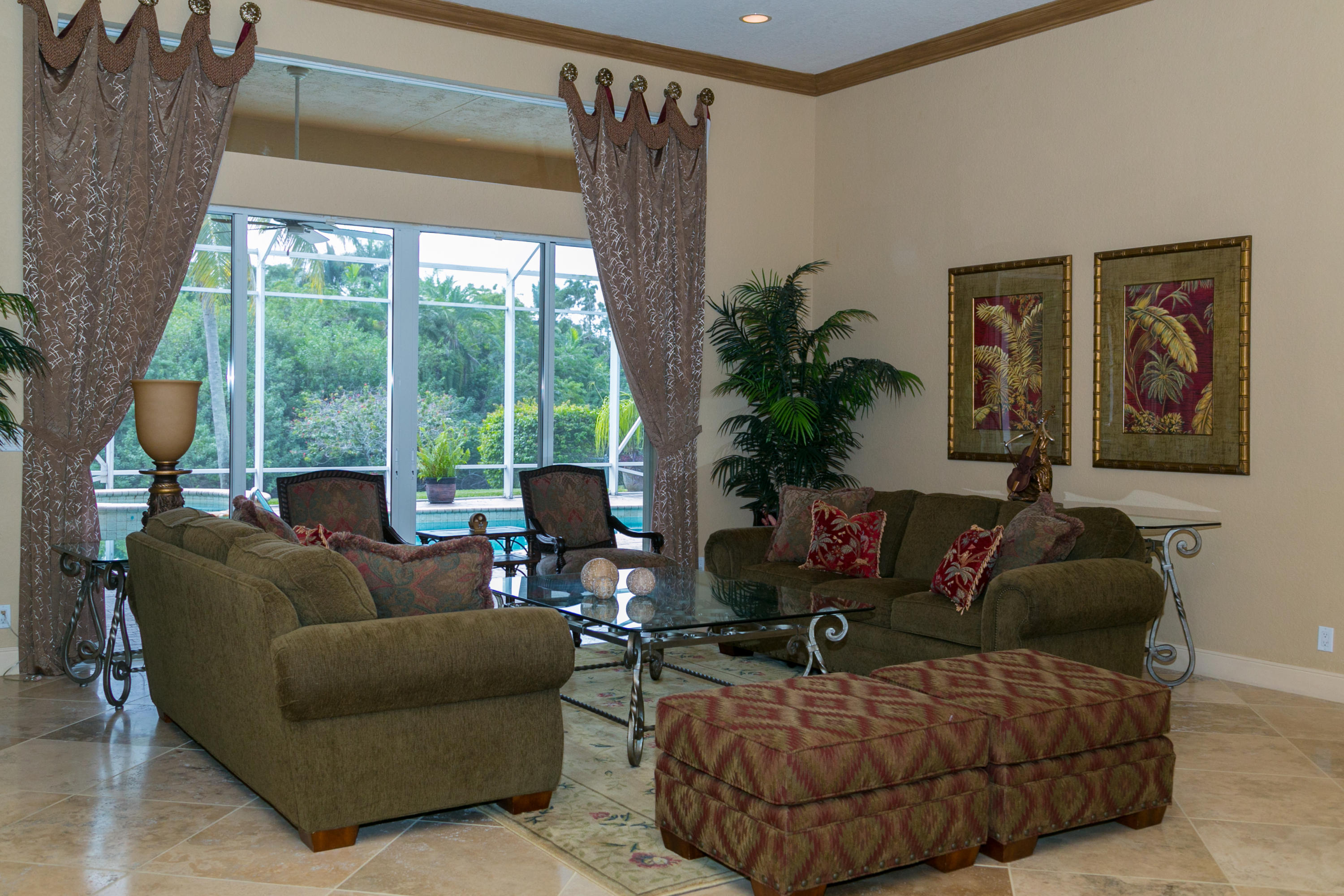 8666 Sawpine Road Delray Beach, FL 33446 - Photo 31 of 49 a living room with furniture and a large window