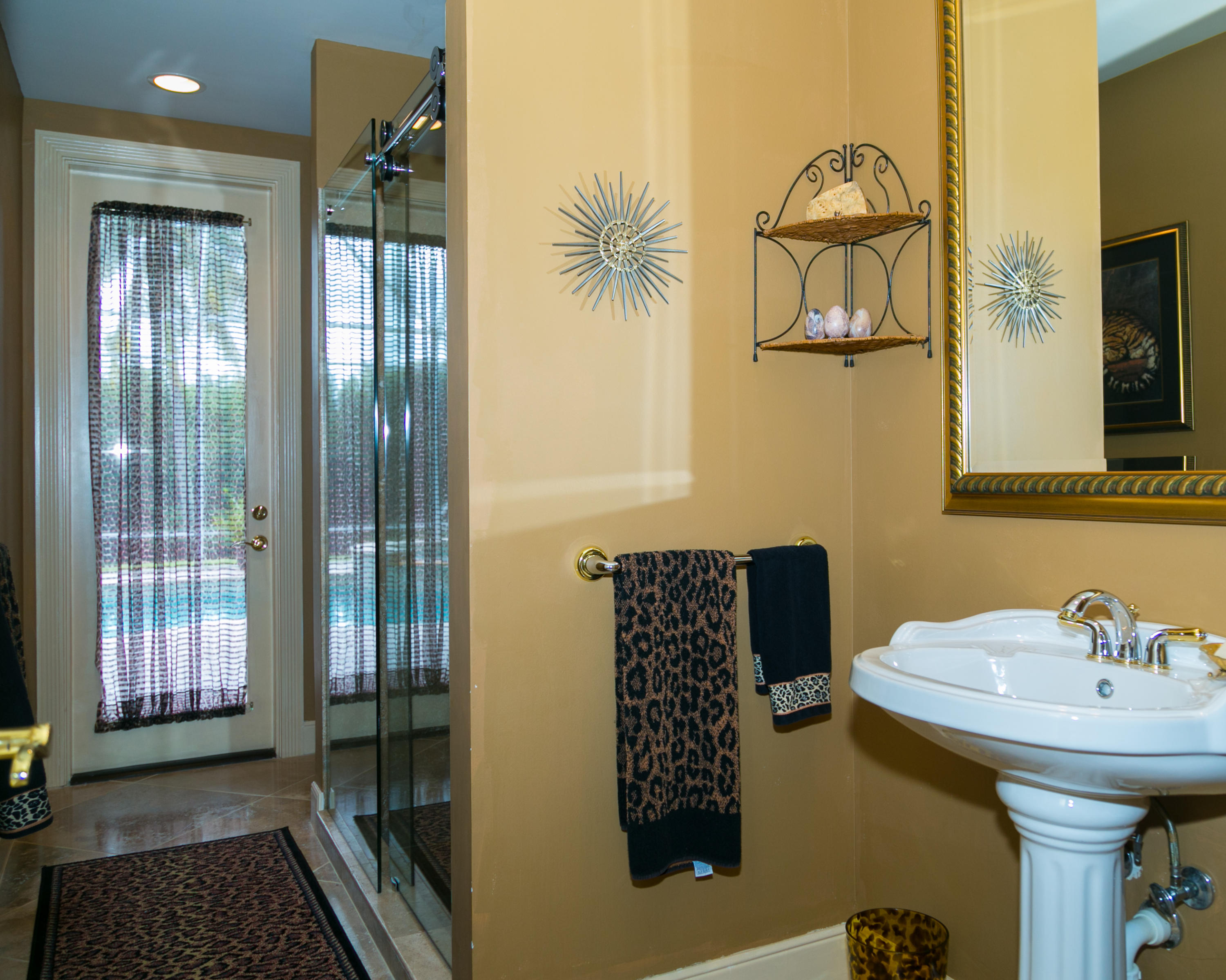 8666 Sawpine Road Delray Beach, FL 33446 - Photo 35 of 49 a bathroom with a sink and a mirror