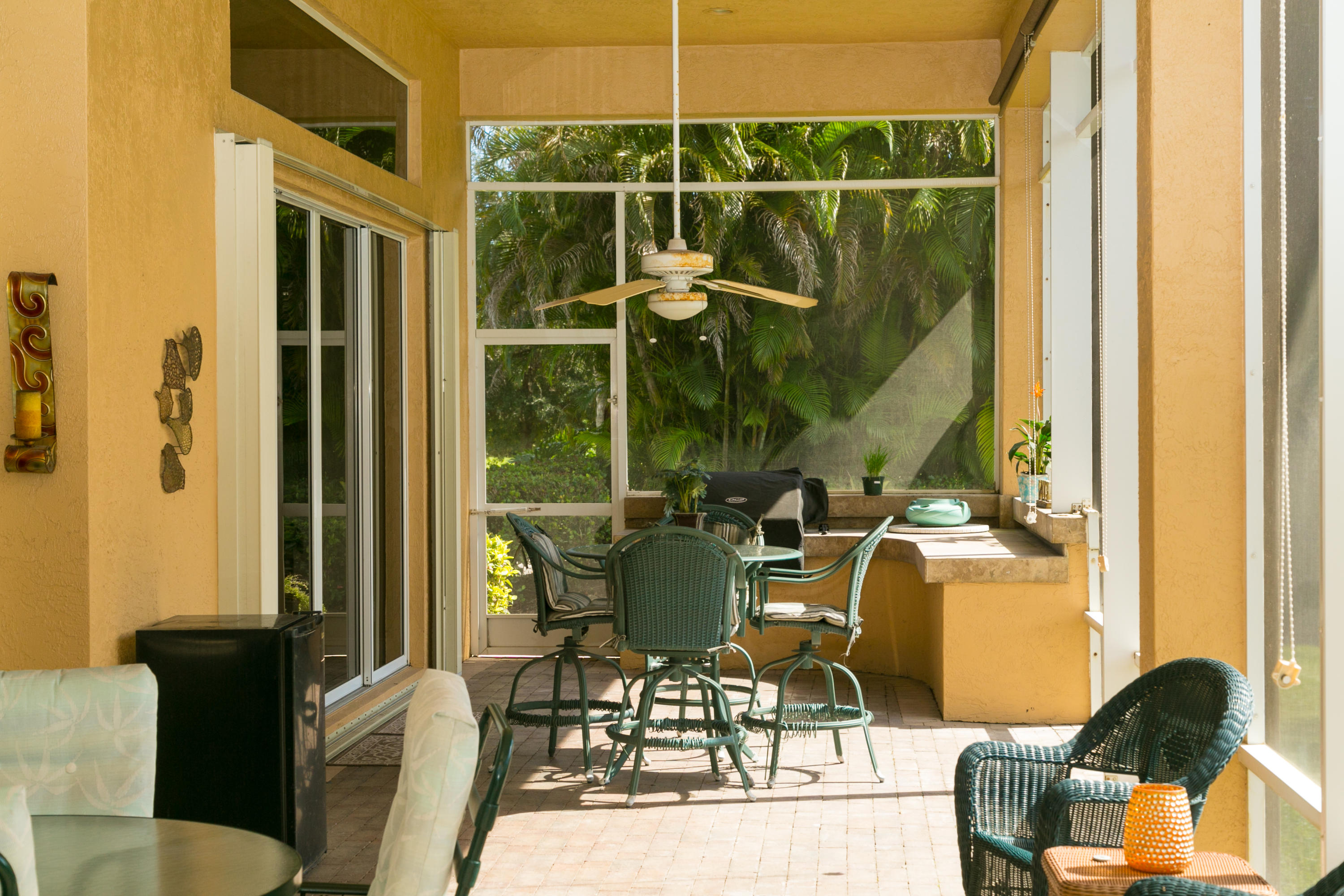 8666 Sawpine Road Delray Beach, FL 33446 - Photo 4 of 49 a living room with furniture and a window