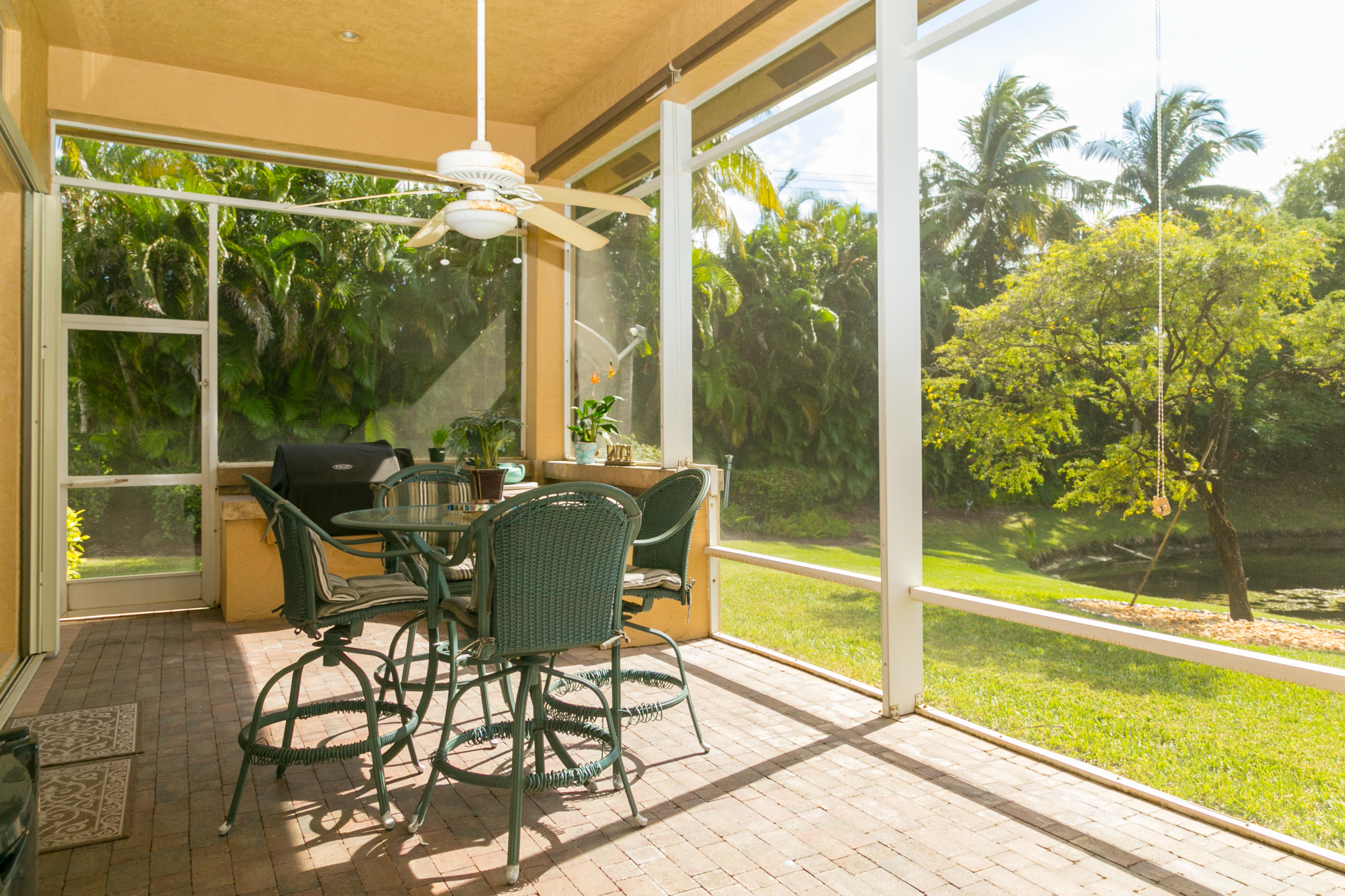 8666 Sawpine Road Delray Beach, FL 33446 - Photo 43 of 49 a view of an outdoor seating area