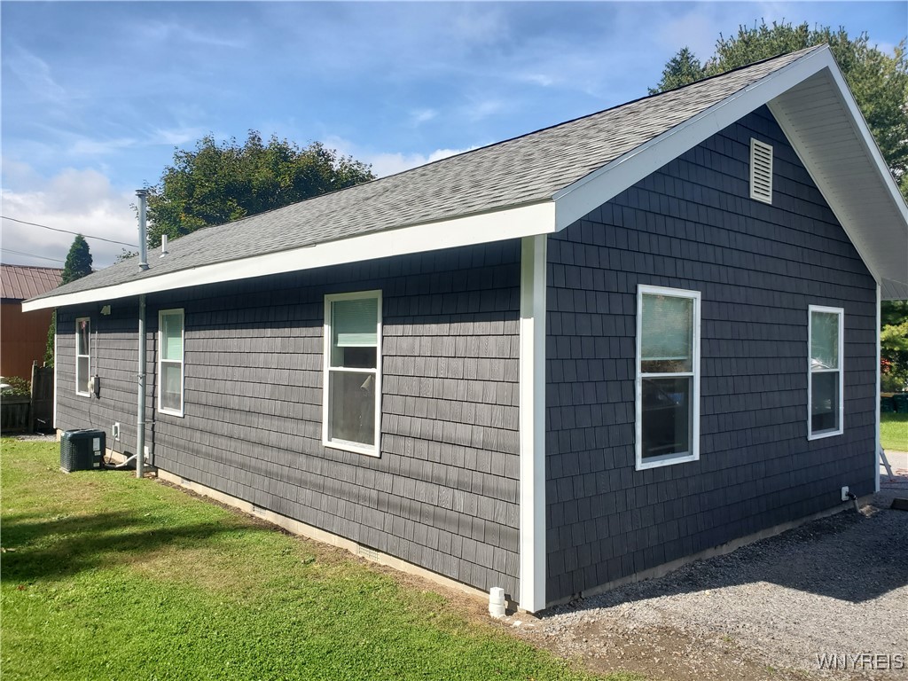 6707 East Lake Road Castile, NY 14427 - Photo 36 of 38 Summer view of home