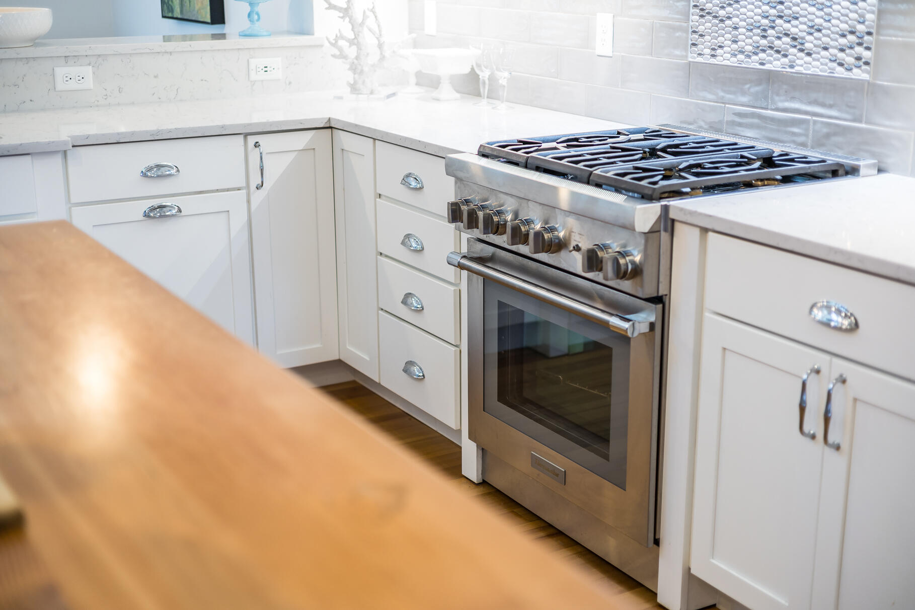 950 Massasoit Road Eastham, MA 02642 - Photo 16 of 66 a kitchen with stove top oven and cabinets