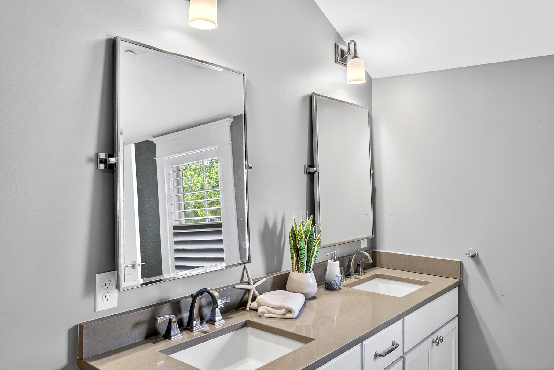 950 Massasoit Road Eastham, MA 02642 - Photo 35 of 66 a bathroom with a sink and a mirror