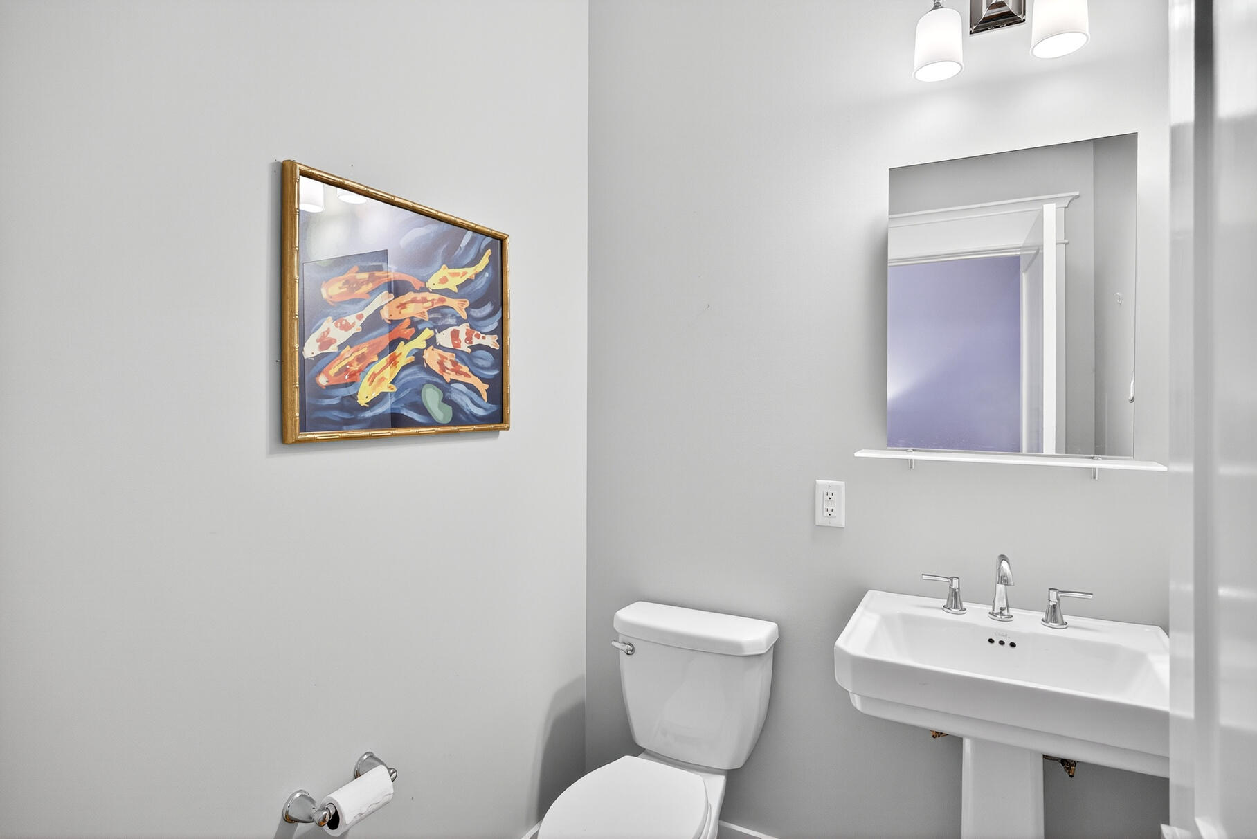 950 Massasoit Road Eastham, MA 02642 - Photo 38 of 66 a bathroom with a toilet a sink and mirror