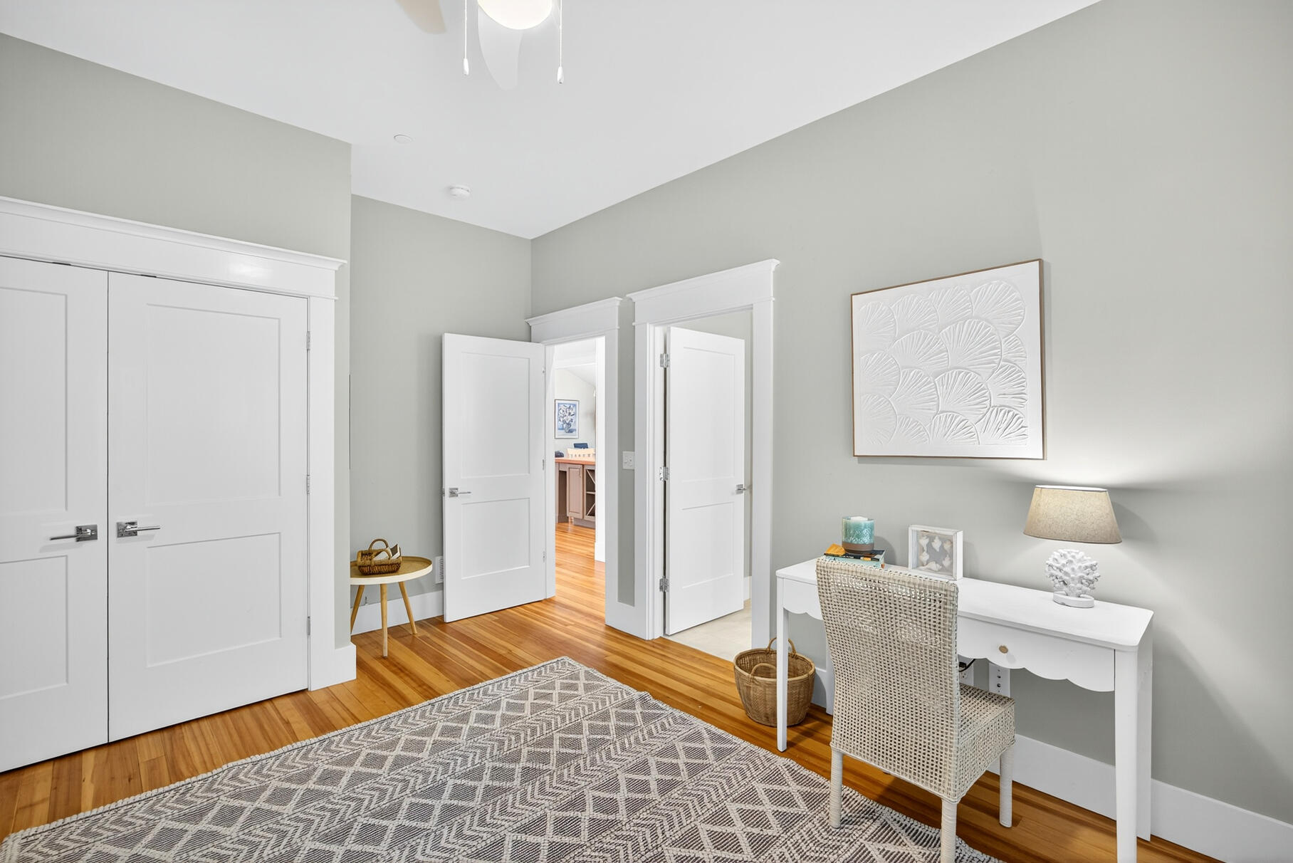 950 Massasoit Road Eastham, MA 02642 - Photo 41 of 66 a bedroom with a bed and wooden floor