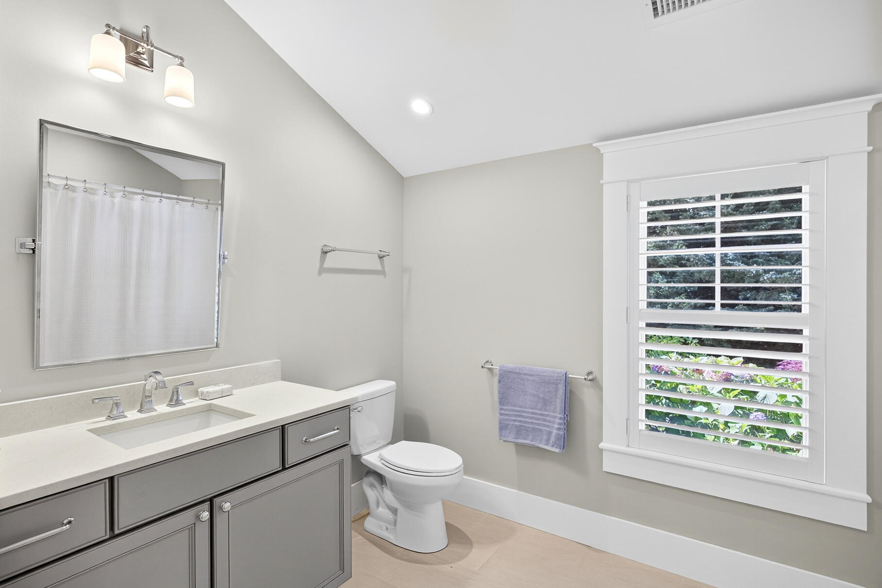 950 Massasoit Road Eastham, MA 02642 - Photo 44 of 66 a bathroom with a toilet a sink and mirror