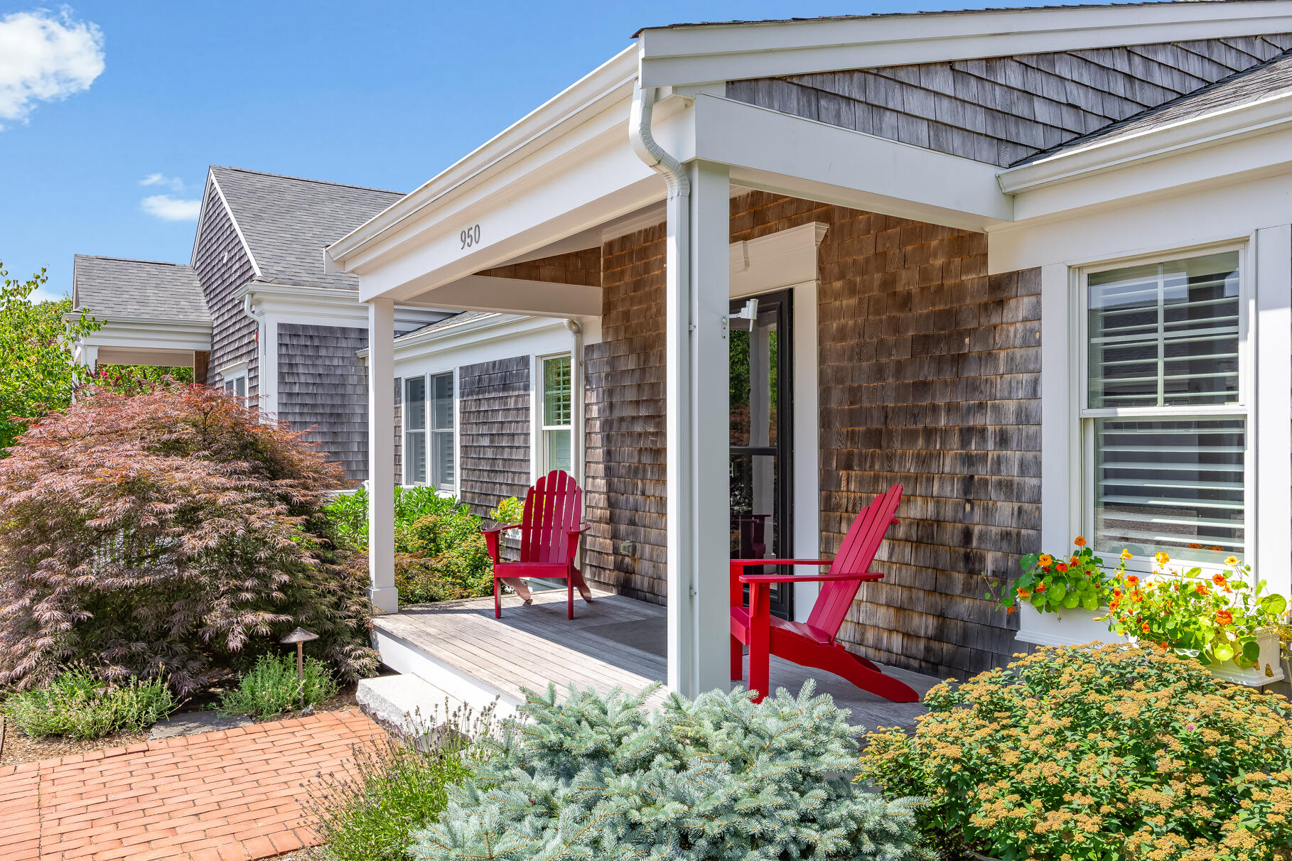 950 Massasoit Road Eastham, MA 02642 - Photo 6 of 66 a front view of a house with garden