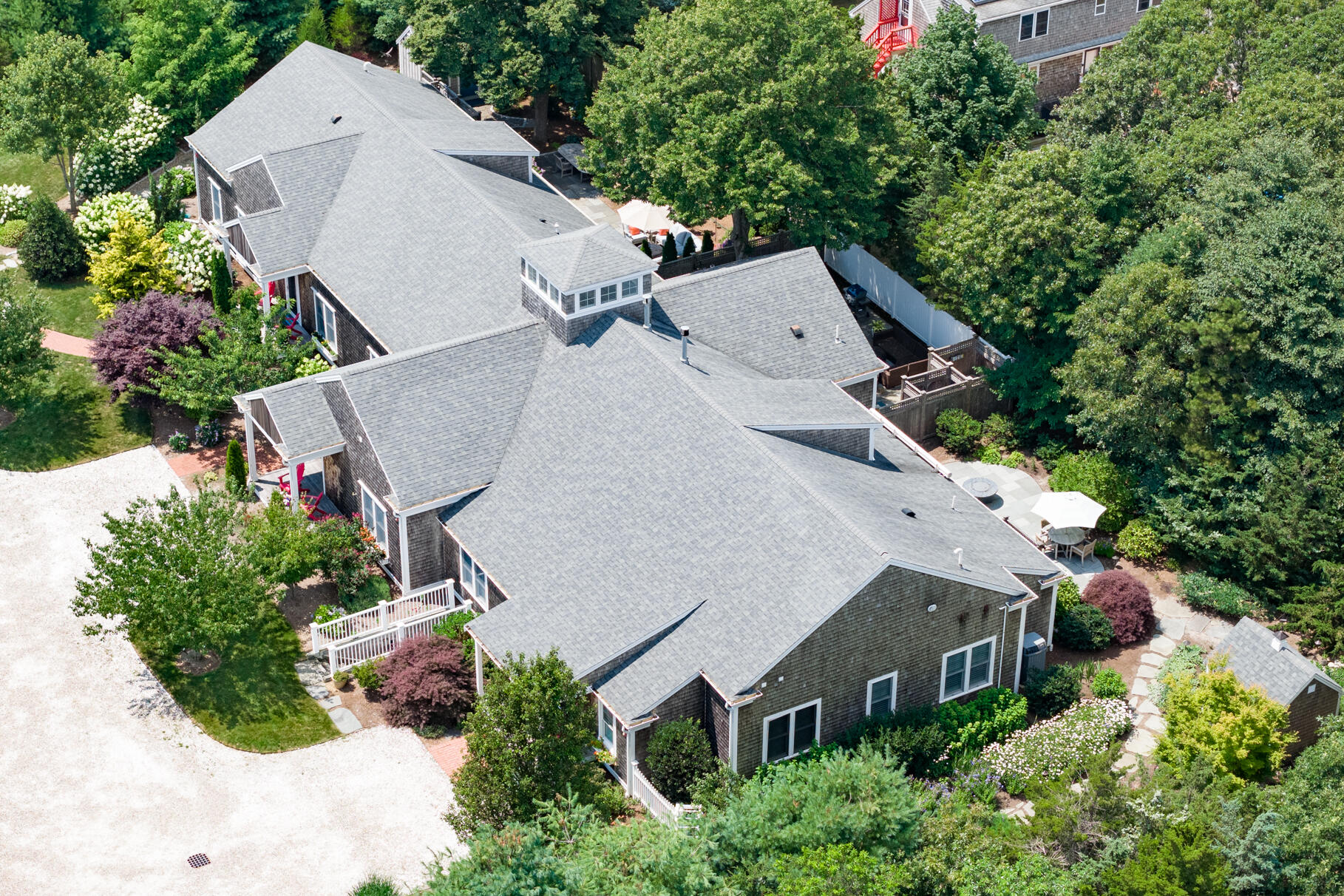 950 Massasoit Road Eastham, MA 02642 - Photo 61 of 66 an aerial view of a house with yard and outdoor seating