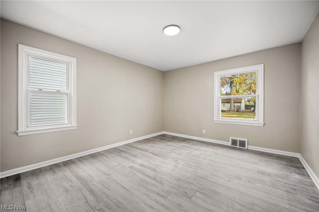 4892 Corliss Road Cleveland, OH 44124 - Photo 18 of 35 Bedroom with light hardwood / wood-style floors